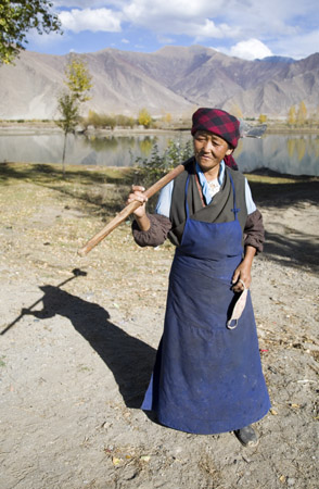 Farmer with hoe 2 on the road to Lhasa Tibet
